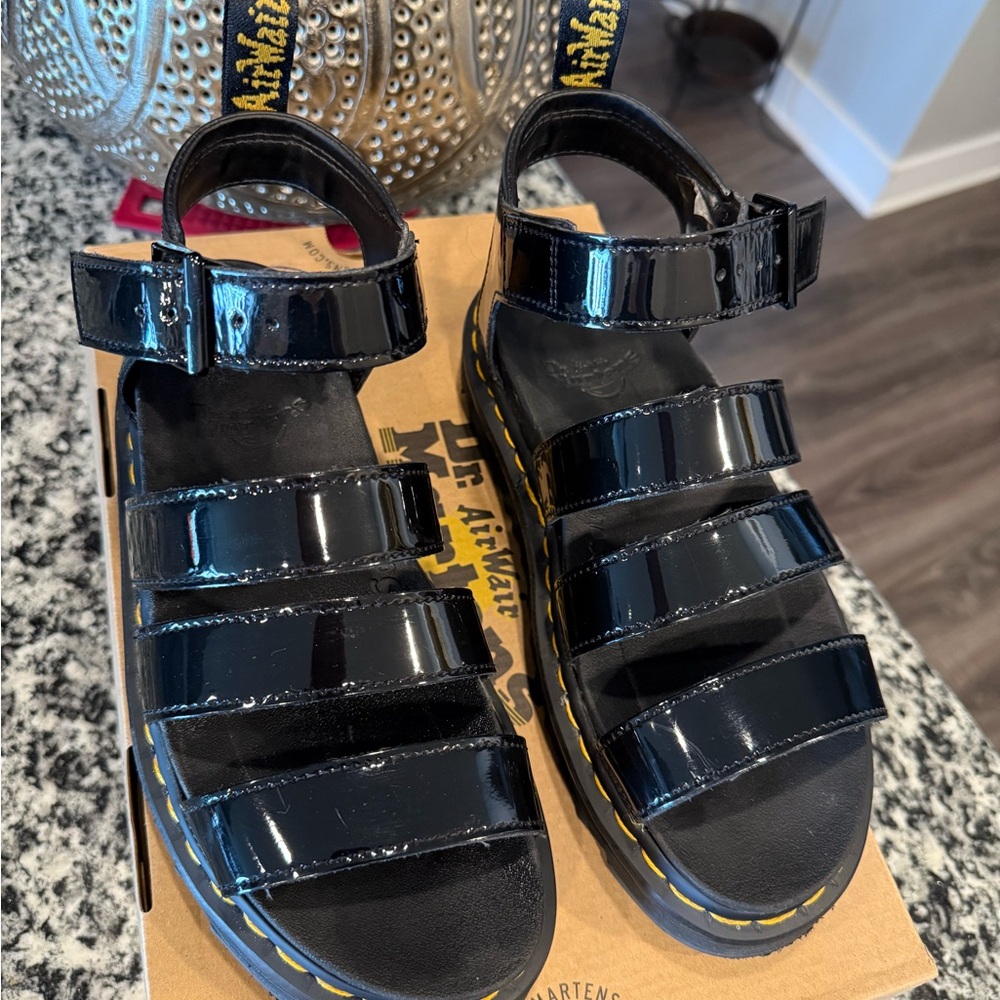 Dr. Martens Black Patent 
Sandals Sleek Minimalist Design